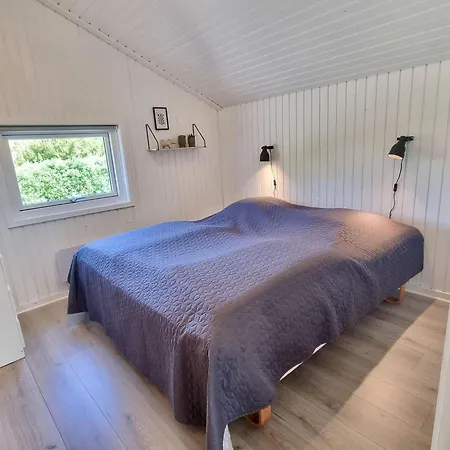 Gemuetliches-ferienhaus-nahe-ostsee-mit-terrasse-und-holzofen Vakantiehuis